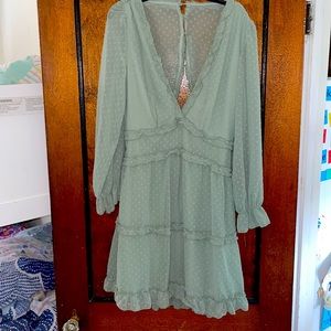 Women’s flirty polka dot sheer dress